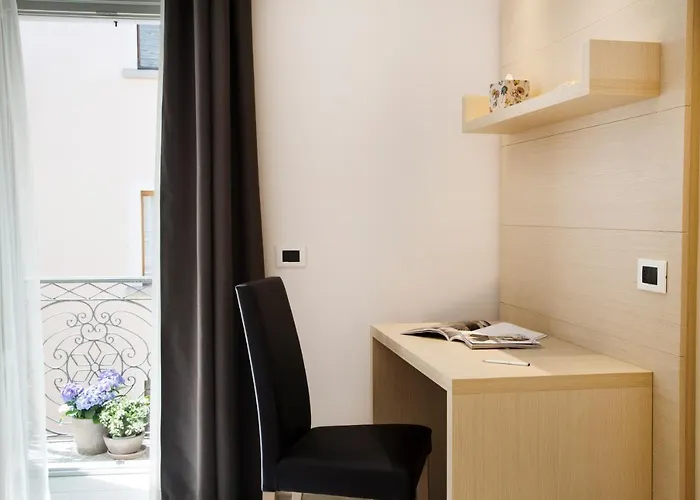 Domus Aparthotel 4*